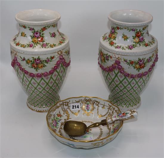 A pair of German rose painted vases and a French bowl and ladle